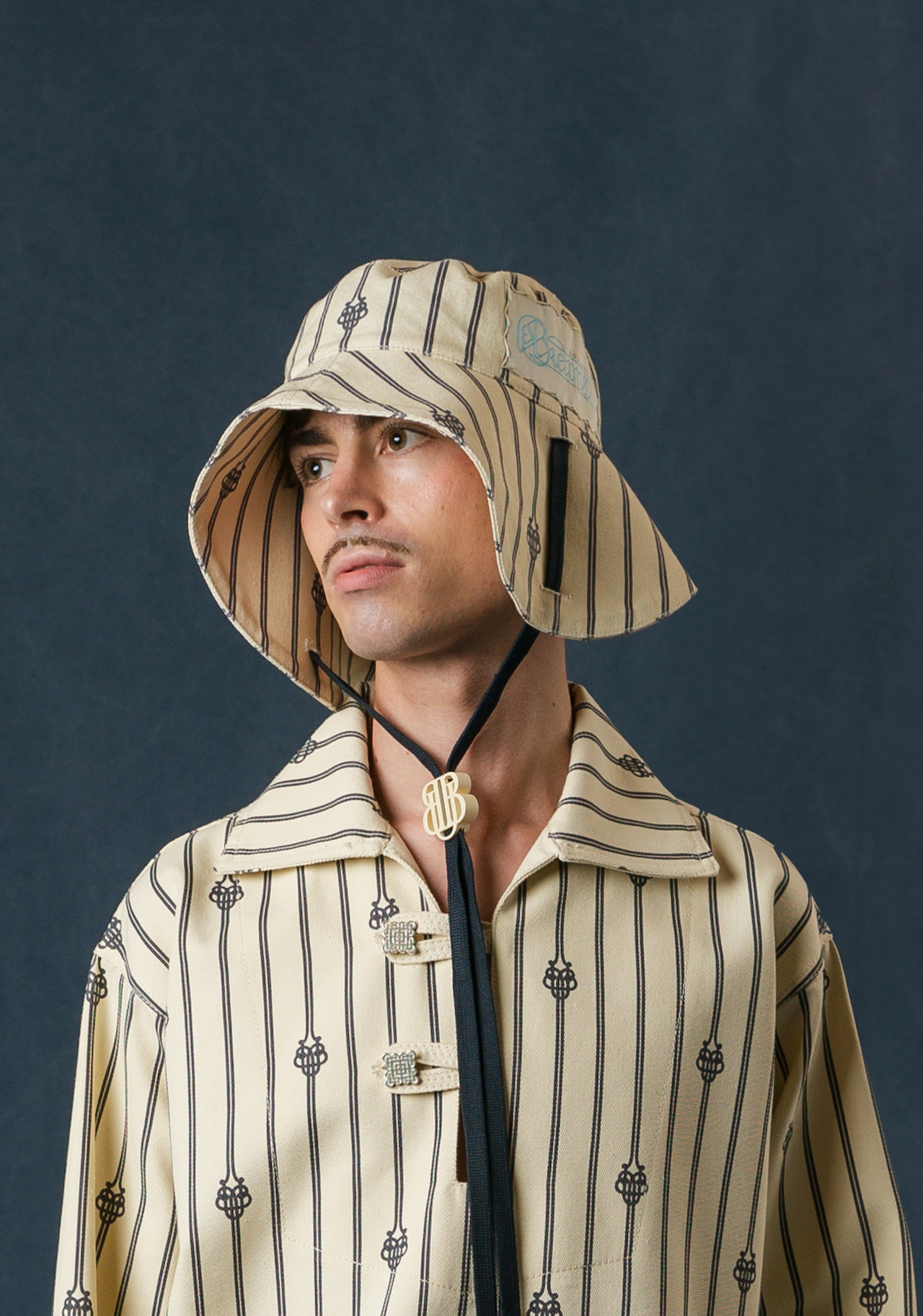 UB MONOGRAM SHORT ROPE WIDE BRIM HAT