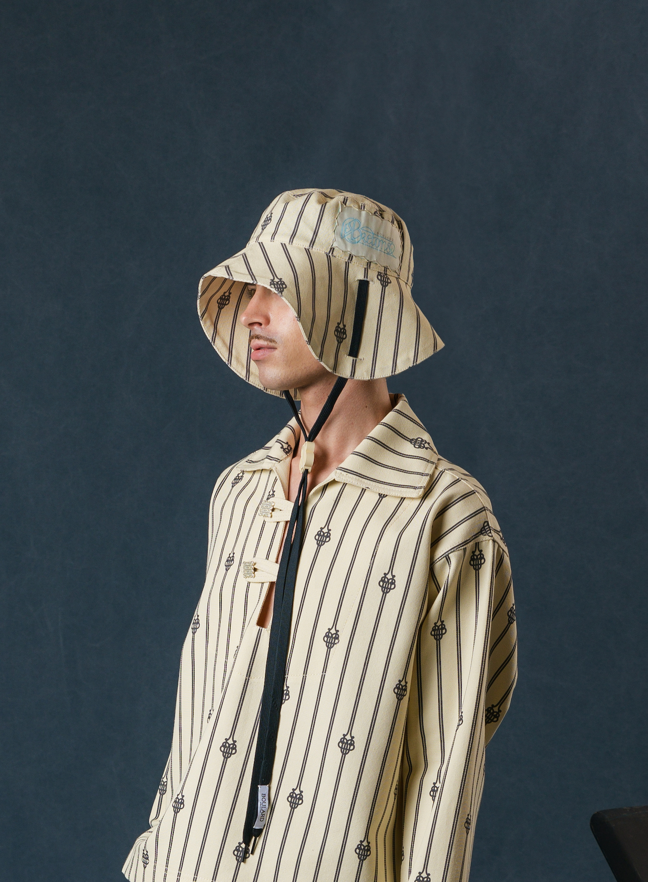 UB MONOGRAM SHORT ROPE WIDE BRIM HAT