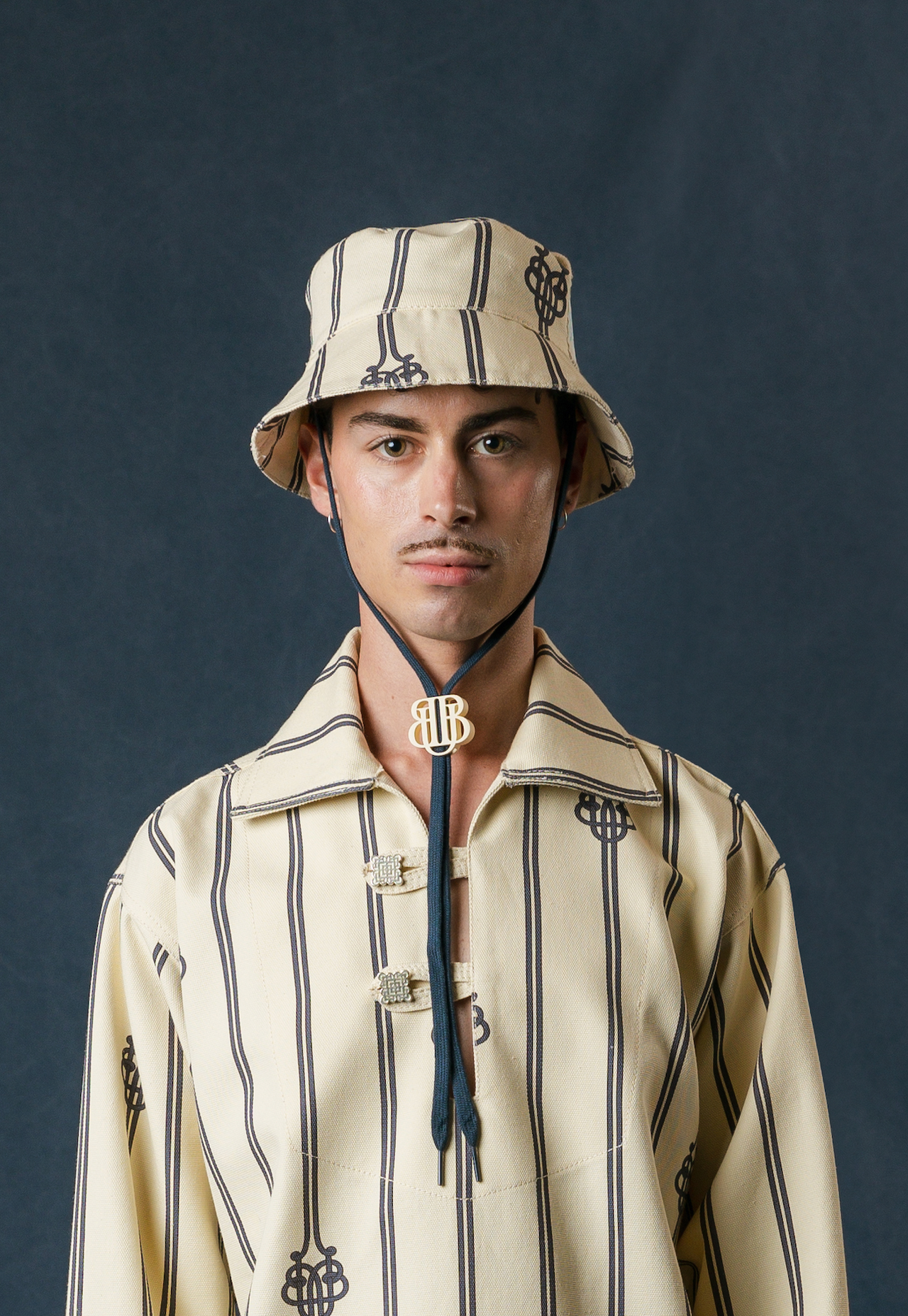 UB MONOGRAM LARGE ROPE BUCKET HAT